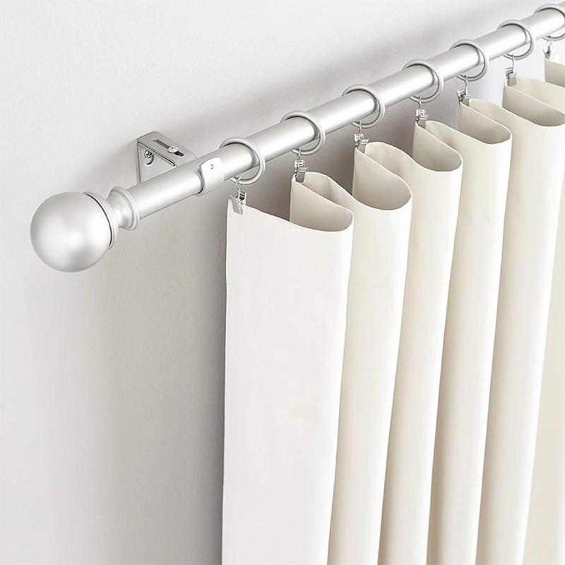High Performance Curtain Rods With White Curtain handing on it