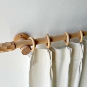 Wall-mounted curtain rod hardware